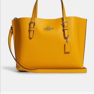 New coach purse still in packaging. Still in box. I paid 130 for it.